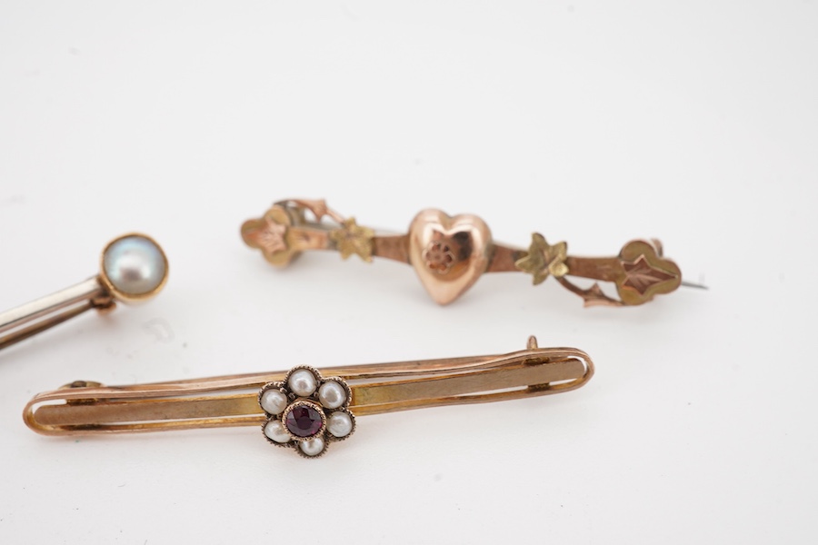Three 9ct bar brooches, one gem set and a yellow metal split pearl and diamond chip set bar brooch, gross weight 10.1 grams.